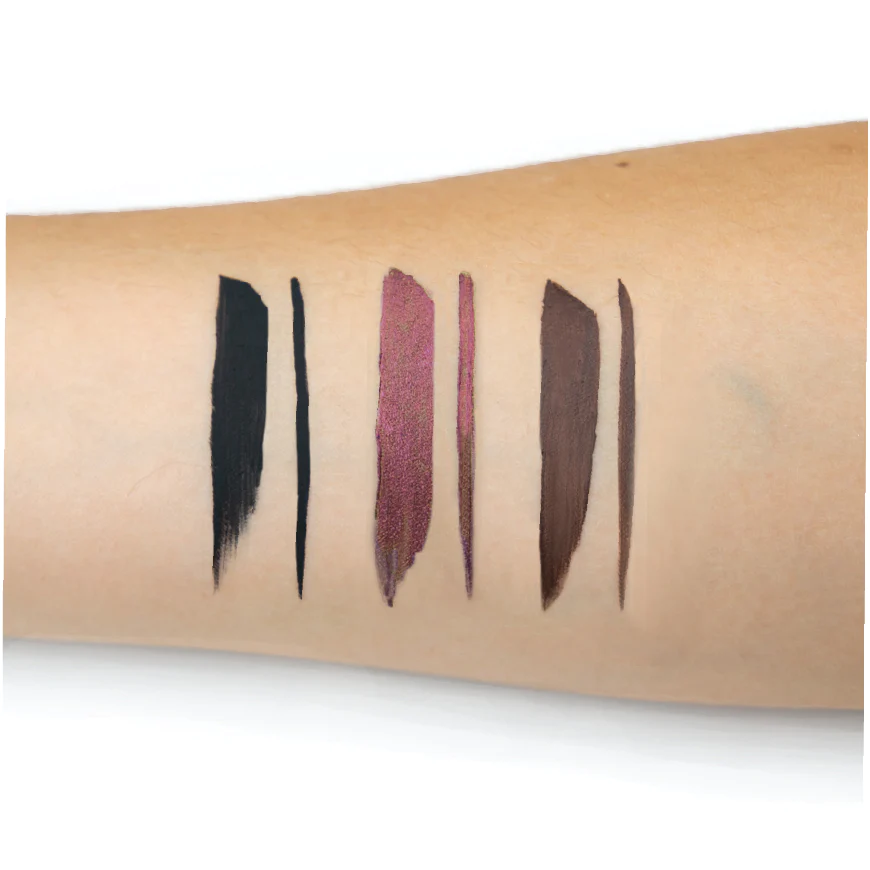 Schwing-trio-brown-purple-black-arm-swatch Комплект течни очни линии theBalm Schwing Trio Limited Edition